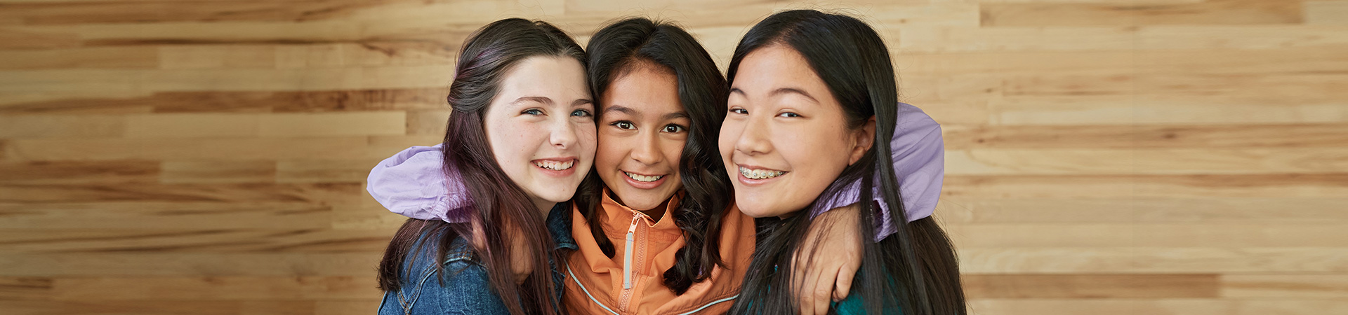  Three girls hugging 