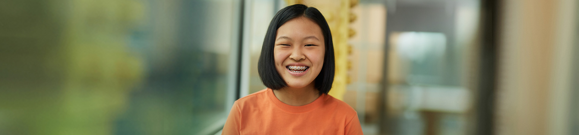  Headshot of a Cadette looking at camera, laughing 